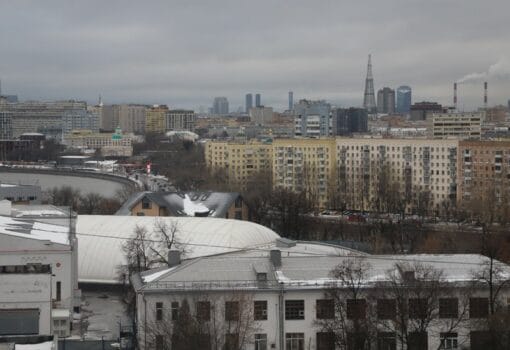 город