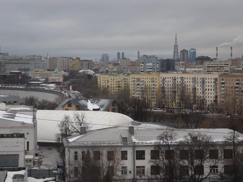 город